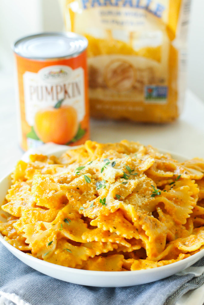 Kick off pumpkin season with a bang with Creamy Herbed Pumpkin Pasta! Tender noodles tossed with a creamy and cheesy pumpkin herb sauce.
