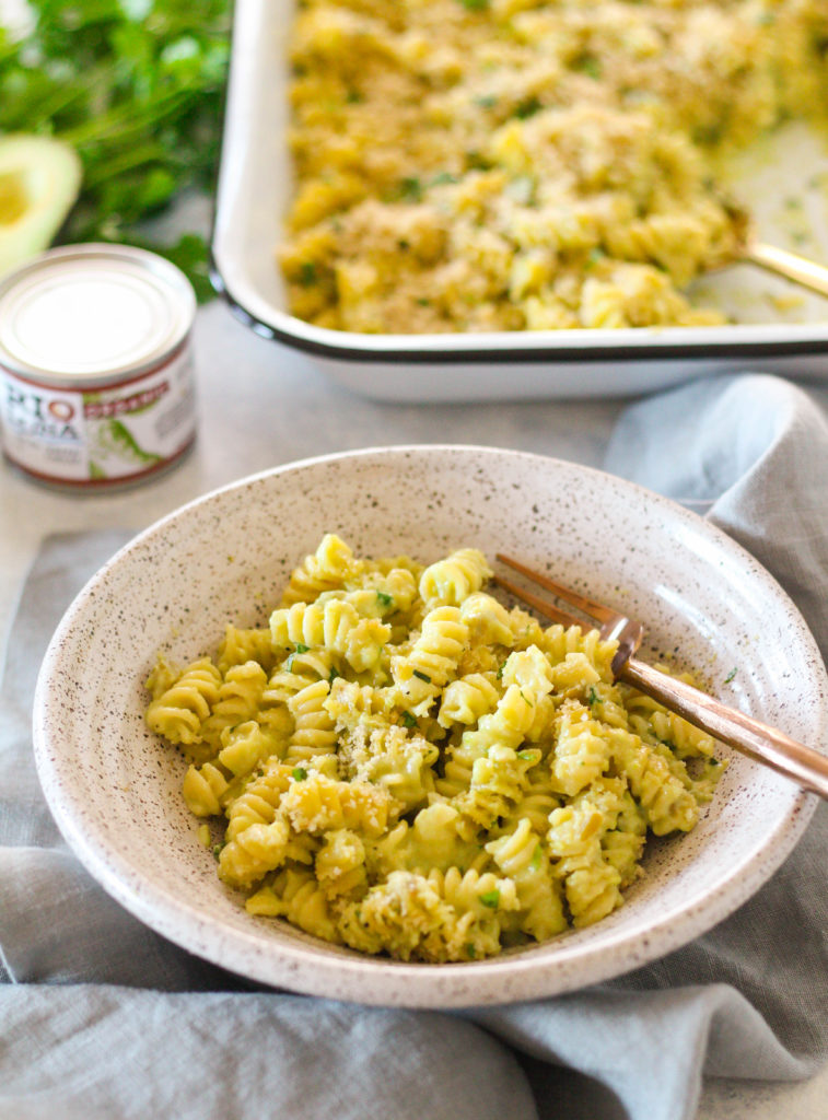 Green chili peppers make their way into a creamy macaroni and cheese made with pepper jack cheese, avocado puree, cilantro and lime. Topped with crispy panko bread crumbs and baked to perfection! This creamy and spicy mac n' cheese is perfect for your holiday party this year. 