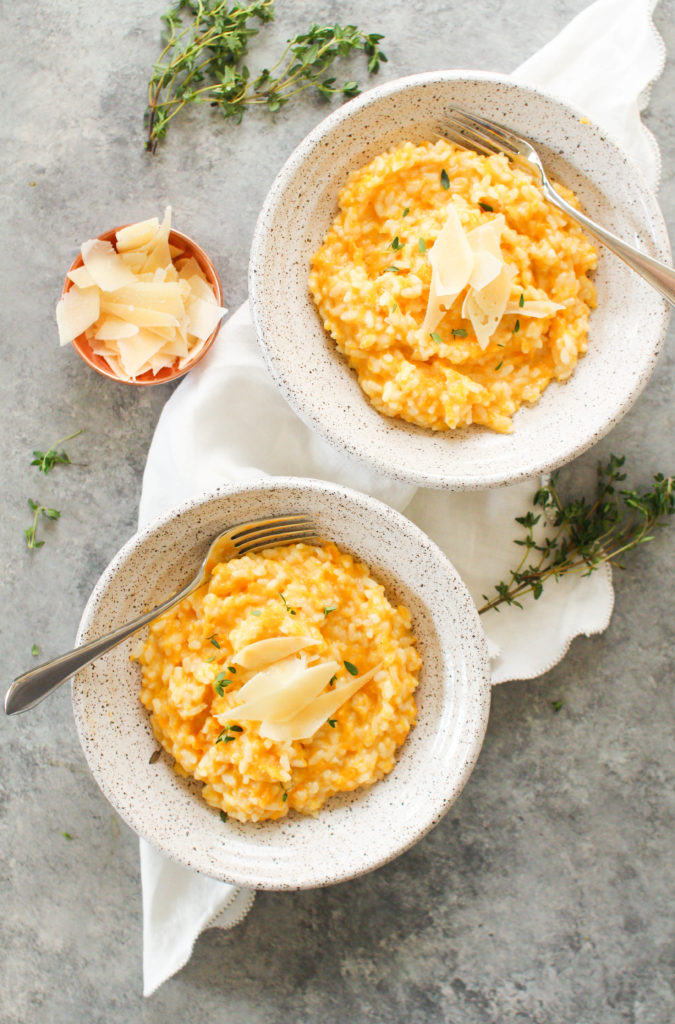 Savory roasted butternut squash, plenty of chicken broth and a splash of white wine is combined with Arborio rice to create this delicious roasted butternut squash risotto. 