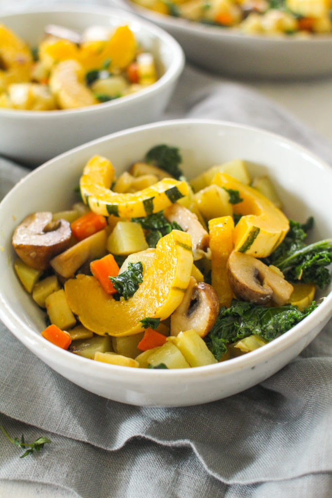 Yukon gold potatoes, parsnips, carrots, mushrooms, delicata squash and kale come together in this quick veggie stir fry. Seasoned with salt, pepper, shallots and fresh thyme, this winter vegetable hash is the perfect accompaniment to any dish. 