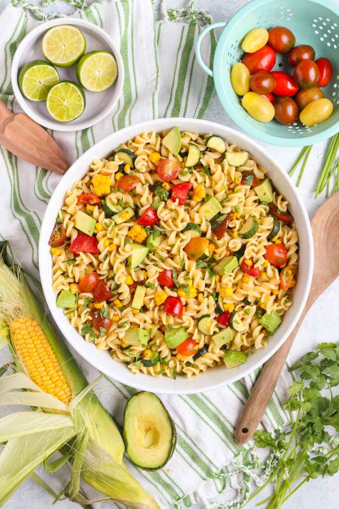 All of your favorite tastes of summer in one salad! Fresh corn, ripe avocado, sweet cherry tomatoes, and a spicy kick from jalapeno.  All tossed with al dente fusilli pasta and hot lime dressing.
