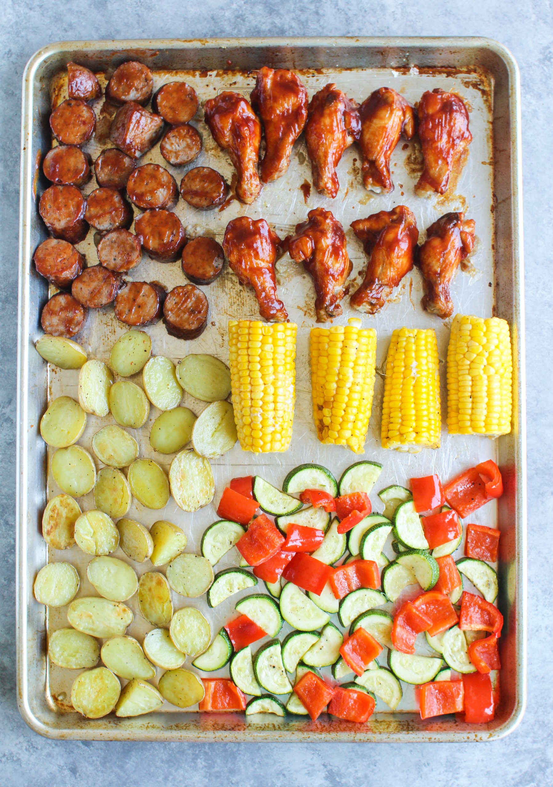 BBQ Sheet Pan Chicken & Sausage with Roasted Corn and Veggies