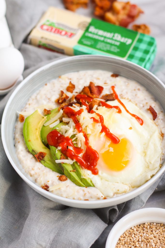 Rethink your oatmeal– it’s time to come to the savory side! Try this savory oatmeal with Vermont sharp cheddar, cottage cheese, fried eggs, bacon, avocado, and sriracha! 